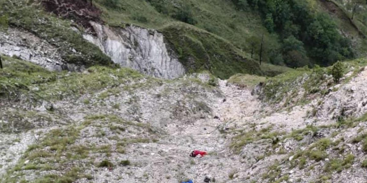 car falls into ditch