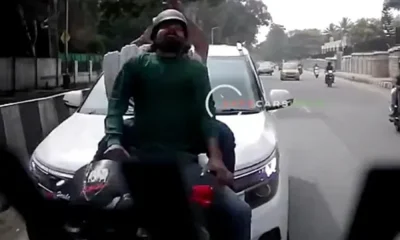Car hits scooter